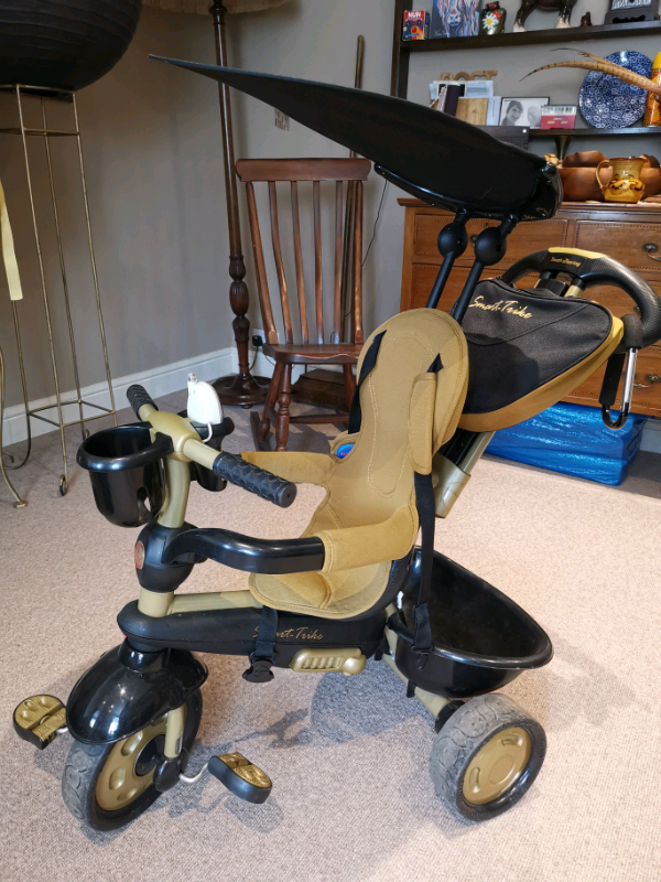 smart trike black and gold